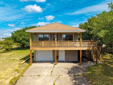 Welcome to Time-Out, a charming oceanside cottage in Kill Devil Hills just an 8-minute walk from the beach.