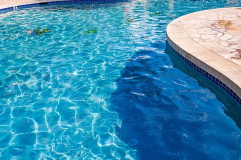 Luxury Condo, Garden View | Pool | Outdoor pool, pool umbrellas, sun loungers