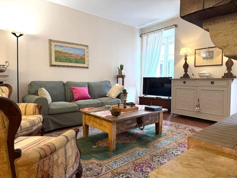 Furniture, Interior Design, Couch, Flooring, Wood, Living Room, Room, Floor, Table, Picture Frame