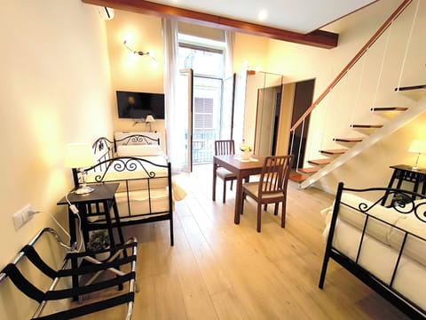 Deluxe Quadruple Room, Balcony, City View | In-room safe, iron/ironing board (on request), WiFi (free)