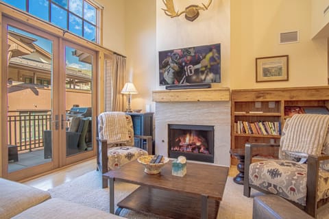 Living Room w/ fireplace and Big Screen TV