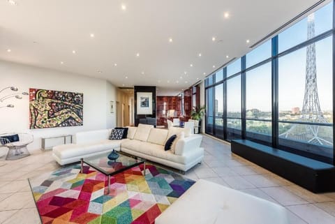 Luxury Apartment, Balcony, City View | Living area | 70-inch Smart TV with digital channels