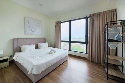 The spacious master bedroom with a king-sized bed and an en-suite.