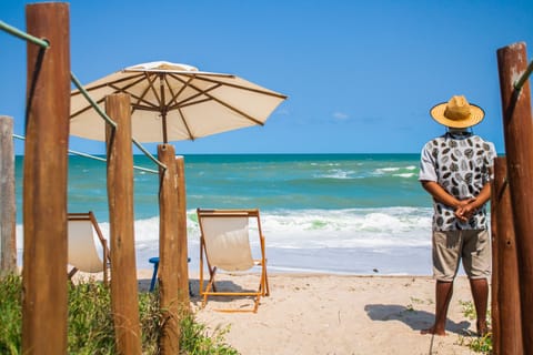 Beach nearby, white sand, sun loungers, beach umbrellas