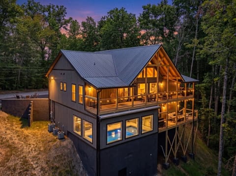 Welcome to The Roosevelt, where striking modern mountain design, glowing evening lights, and multiple levels of outdoor living create an unforgettable retreat from the moment you arrive.