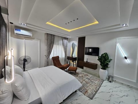 Family Apartment, Balcony, City View | In-room safe, desk, laptop workspace, blackout drapes