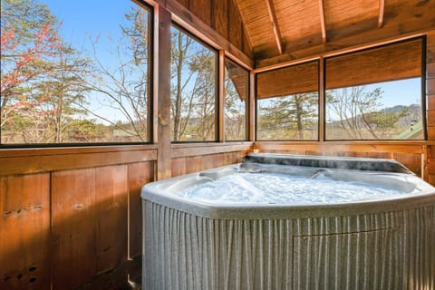Hot Tub Retreat, unwind in this serene space with stunning mountain views and soothing bubbles!