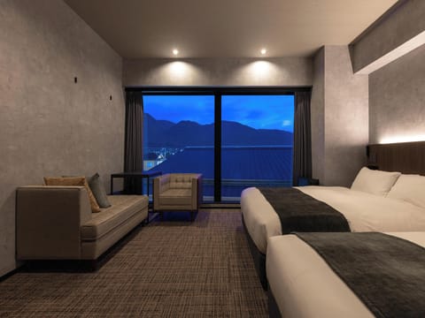 Deluxe Twin Room, Non Smoking | In-room safe, blackout drapes, iron/ironing board (on request)