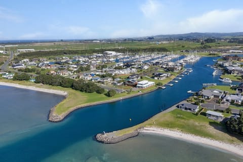 Aerial view showing our prime location right by the marina, canals and pontoon available to use (second one in from the left)