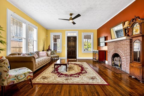 Living Room | Brick Fireplace | Wall-Mounted TV & Display Cabinet