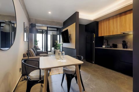 Cozy dining area next to the modern kitchenette.
