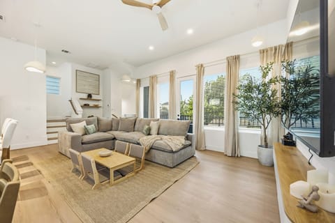 A living room filled with natural light, featuring a Fukinsei-inspired design th