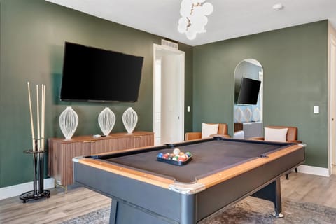 Full-size pool table and TV ready for tournaments