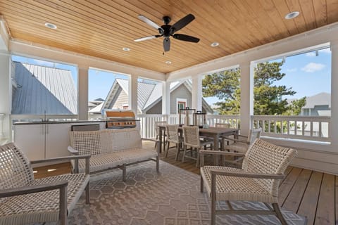 Covered lanai for sunset views and cocktails.