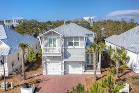 Front exterior view of the two-story coastal home