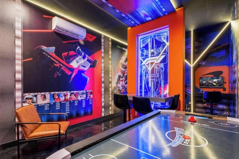 Challenge your friends and family to endless fun in this incredible themed game room. Featuring air hockey, immersive décor, and a vibrant atmosphere, it’s the perfect place to create unforgettable memories together.