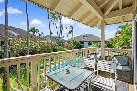 Sip your morning coffee on your private balcony and enjoy pool and tropical garden views surrounded by swaying palms and lush greenery. Perfect for unwinding in paradise.
