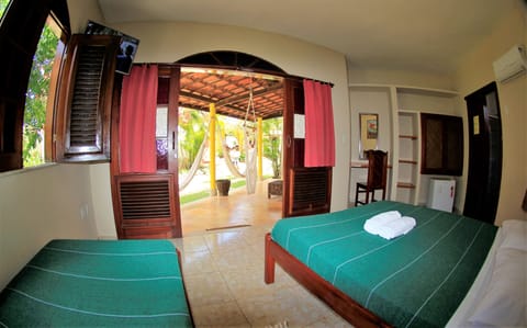 Comfort Room, Air conditioning, Garden View | WiFi (free)