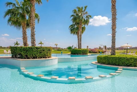 Relax and unwind by the sparkling pool.