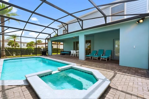 Sunshine state of mind! Dive or unwind in your private screened pool.