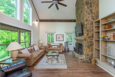Welcome to this beautiful, open living room, great for gathering around with your crew.