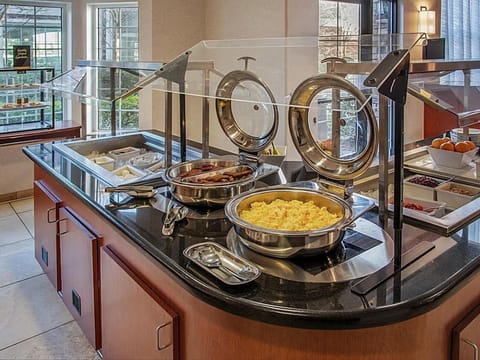 Savor a hearty breakfast with an array of choices, all set for you to enjoy.