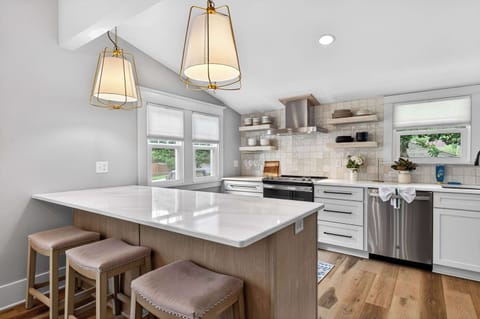 Kitchen: Prepare anything from quick snacks to full meals in the fully equipped kitchen, featuring modern appliances, ample counter space, and essential cookware.