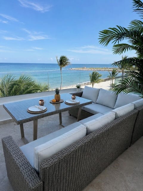 Enjoy meals with a front-row seat of the Caribbean Sea.