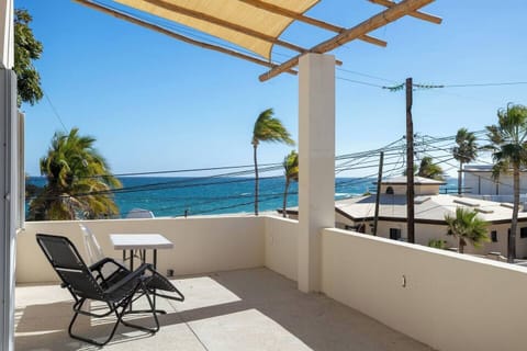 Outdoor patio eating and relaxing area outside mid level studio bedroom