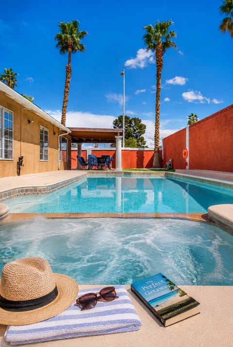 Private backyard escape is all yours. Take a refreshing dip in the sparkling pool, unwind in the bubbling hot tub, or stretch out on a lounger beneath the Las Vegas sun.