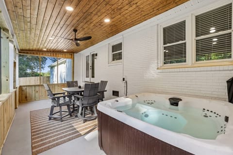 Sit back and relax on the screened in porch or unwind in the hot tub