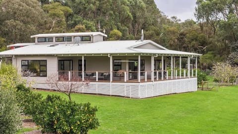 The expansive backyard provides plenty of room to enjoy the outdoors, whether you're playing with the family, stretching out on the grass or simply taking in the views.