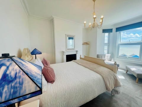 Bedroom 3 with double bed and views of the sea
