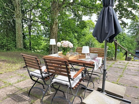 Furniture, Outdoor Furniture, Chair, Table, Outdoor Table, Garden, Shade, Flowerpot, Hardwood, Kitchen & Dining Room Table