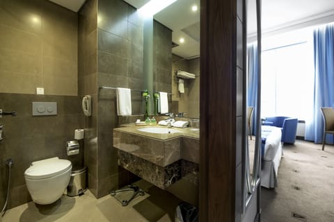 Combined shower/tub, free toiletries, hair dryer, bathrobes