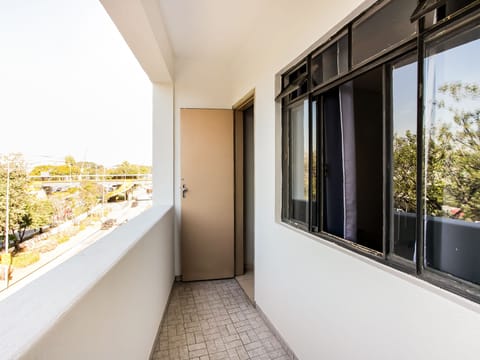 Quadruple Room (4 Single Beds) | Balcony