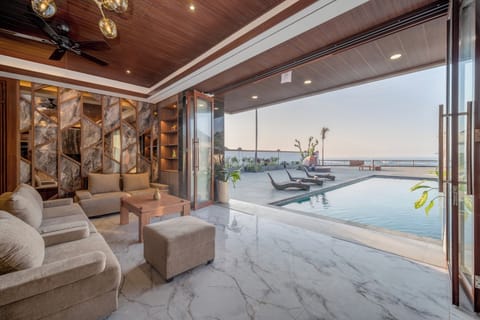 Villa, 5 Bedrooms, Balcony, Sea View | Living area | 36-inch LCD TV with digital channels