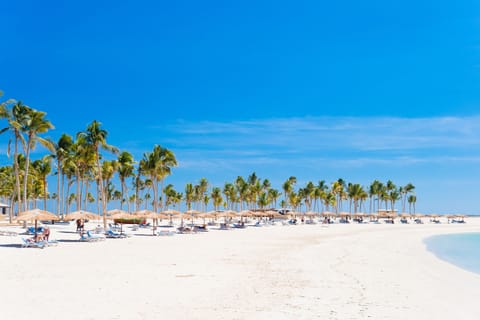 Private beach, white sand, sun loungers, beach umbrellas