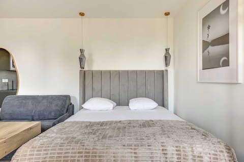 House | Laptop workspace, iron/ironing board, bed sheets