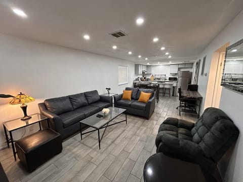 Spacious living room with TV