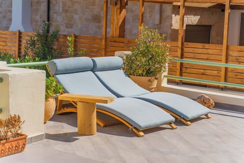 Relaxing outdoor seating area, perfect for unwinding during your stay.
