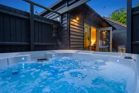 Enjoy the hot tub under the stars before stepping into the lodge