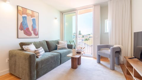 Sunny lounge with a private balcony. #SunnyStay #BalconyLife