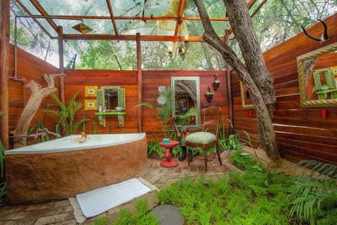 Separate tub and shower, rainfall showerhead, eco-friendly toiletries
