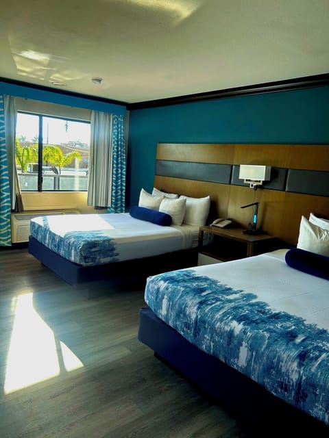 Room, 2 Queen Beds | Hypo-allergenic bedding, iron/ironing board, free WiFi, bed sheets