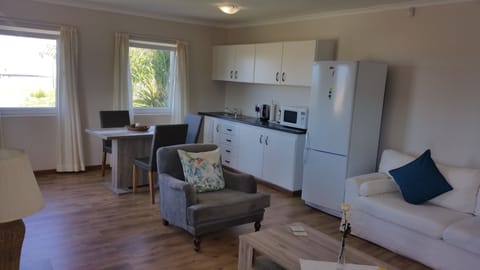 One-Bedroom Apartment With Sea View | Private kitchen | Fridge, microwave, coffee/tea maker, electric kettle