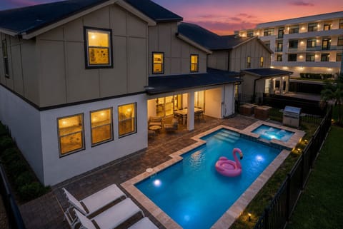 Private pool and spa at dusk with a stylish patio for relaxing evenings