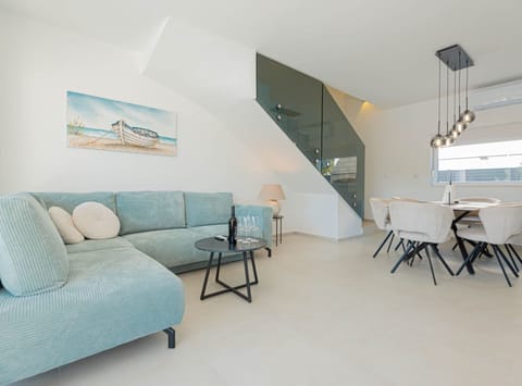 Villa (Three Bedroom Villa with Outdoor Swim) | Living room | 32-inch flat-screen TV with digital channels
