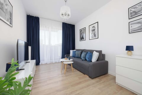 Bright living room with comfortable seating and modern décor.