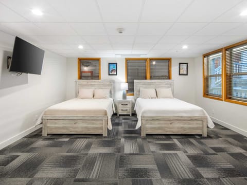Two queen beds and a Smart TV
